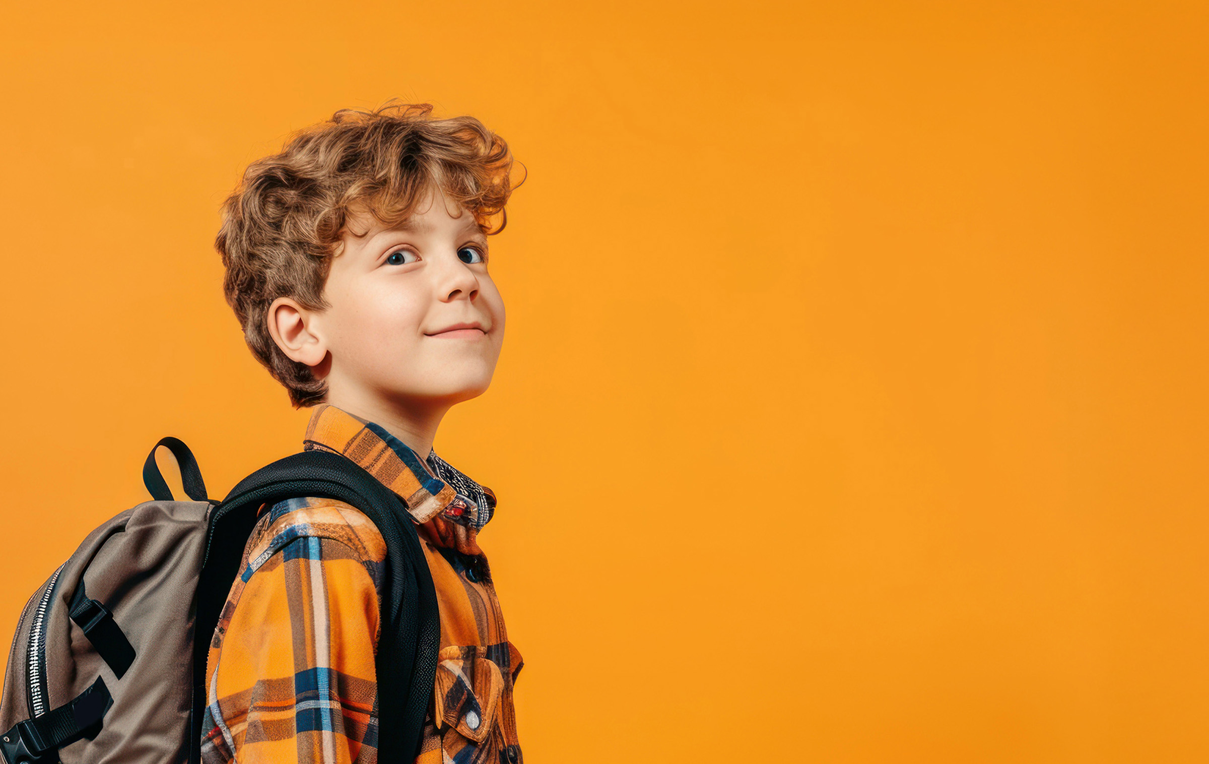 The Ronald S. Lauder Impact Initiative — boy on orange background